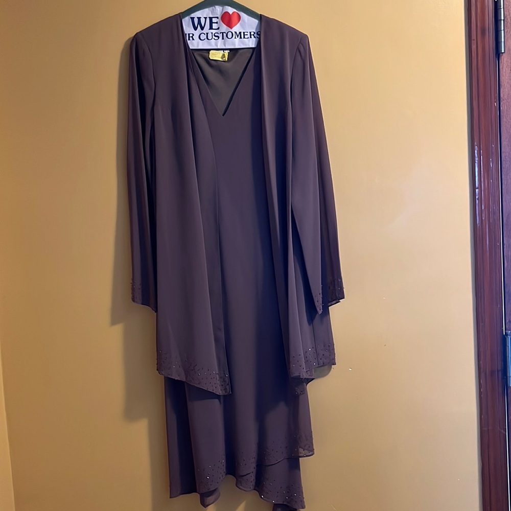 Adrianna Papell- Dress in brown with sequins details on sleeves.  100%Polyester
